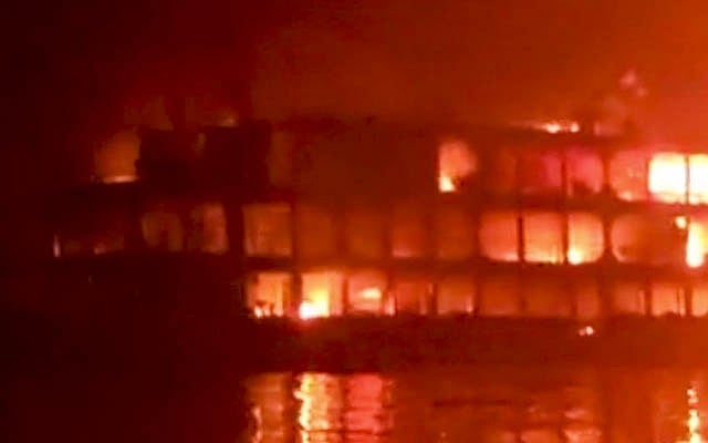 A midnight fire swept through the Barguna-bound MV Abhijan-10 launch on the Sugandha river in the southern district of Jhalakathi on Friday, Dec 24, 2021. 