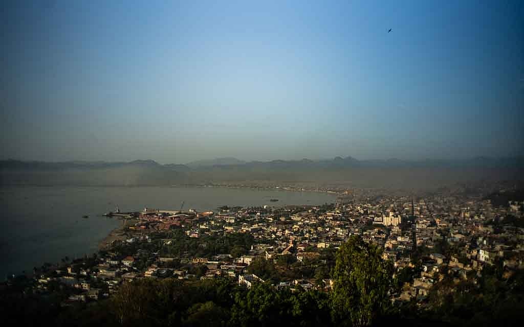 FILE — Cap-Haitien, Haiti, at sunrise on July 23, 2021. The long occupation of Haiti began with a drumbeat from the bank that became Citigroup, decades of diplomatic correspondence and other records show. Federico Rios/The New York Times 